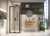 Black bifold shower door and side panel